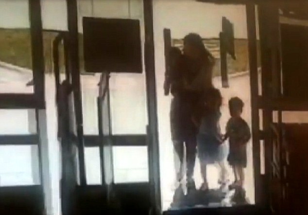 CCTV: Woo and her children were seen in surveillance at a Walgreens, pictured, near her home. They were later spotted on surveillance video (pictured) at a McDonald's across the road from where her body was found